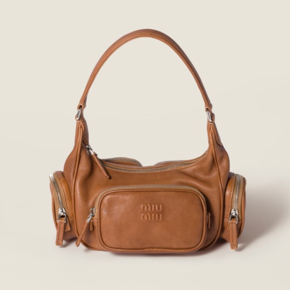 Miu Miu Handbags - miu miu pocket nappa leather bag NEW